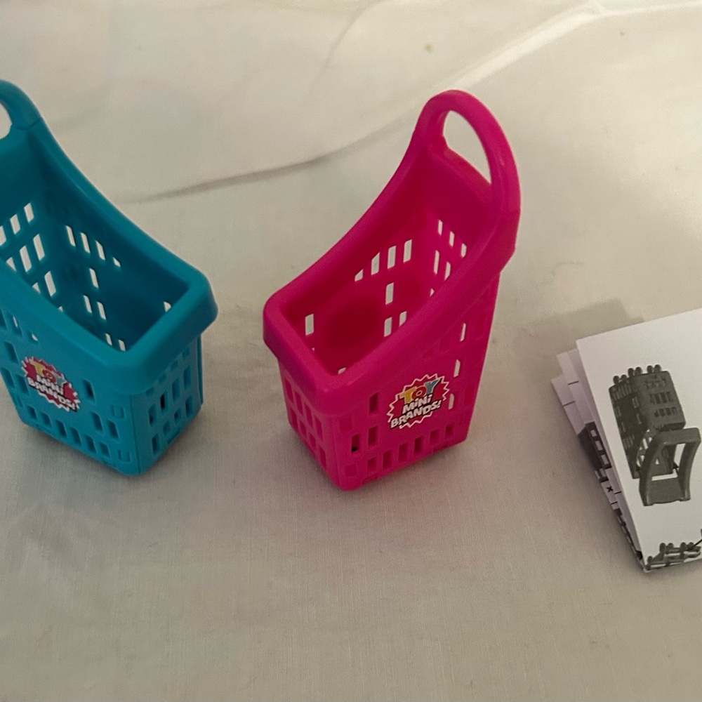 Two Mini Brand Shopping Baskets With Wheels-Pink And Blue